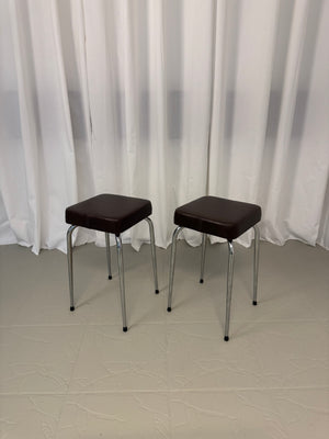 Set of two vintage brown leather stools