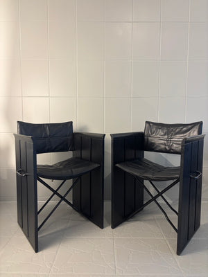 Set of 2 vintage black leather chairs