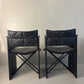 Set of 2 vintage black leather chairs
