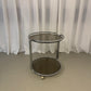Smoked glass serving trolley