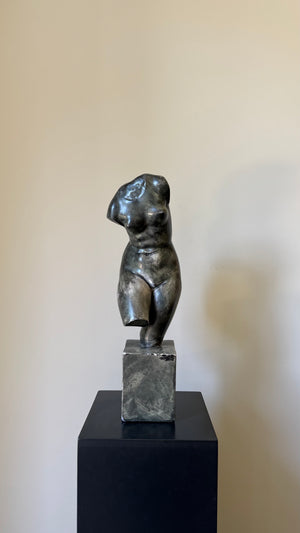 Female torso sculpture