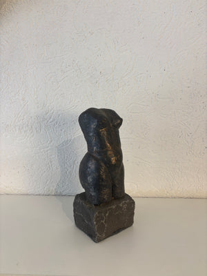 Female bronze torso sculpture