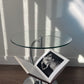 Glass side table with magazine holder