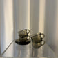 Set of 4 Arcoroc smoked glass coffee cups and saucers