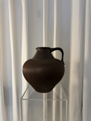 Brown ceramic vase with handle