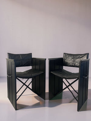 Set of 2 vintage black leather chairs