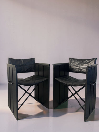 Set of 2 vintage black leather chairs