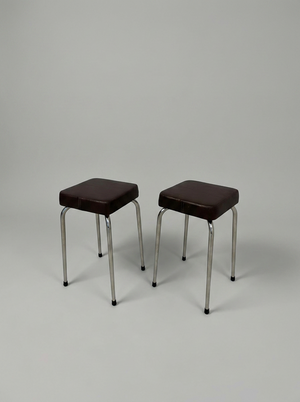 Set of two vintage brown leather stools