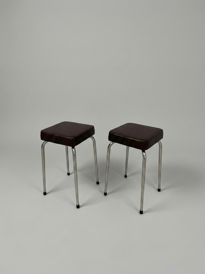 Set of two vintage brown leather stools