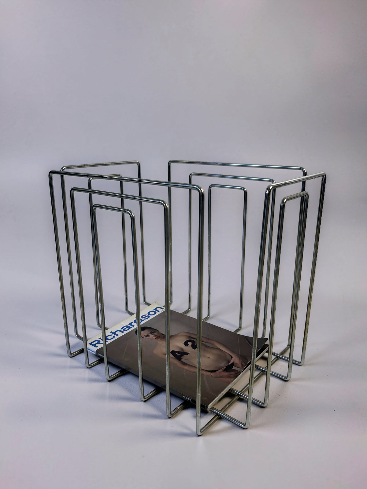 TMP magazine rack by Willi Glaeser