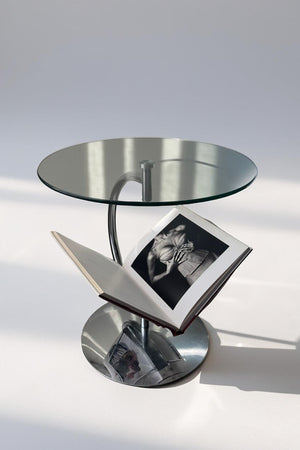 Glass side table with magazine holder