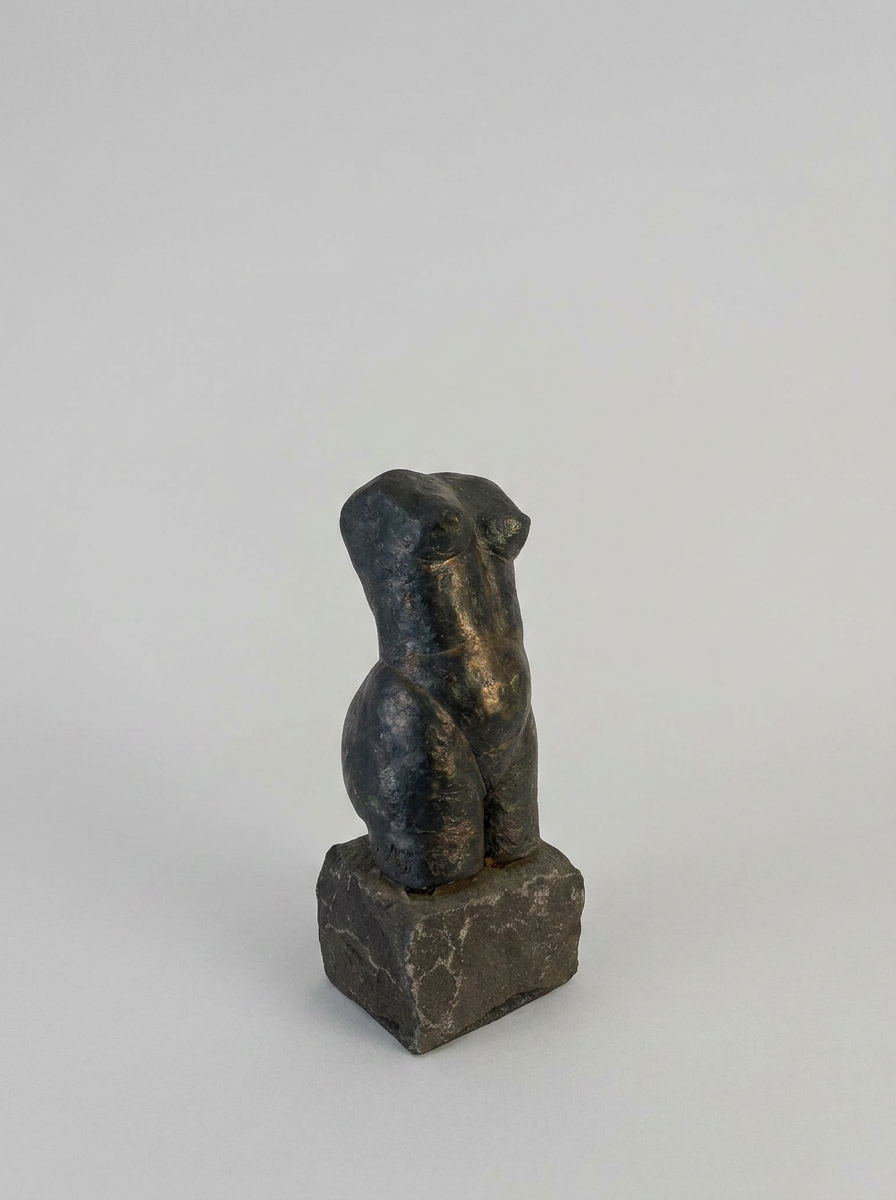 Female bronze torso sculpture
