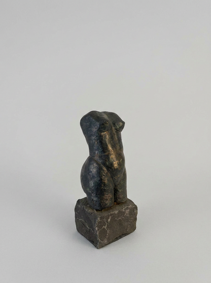 Female bronze torso sculpture