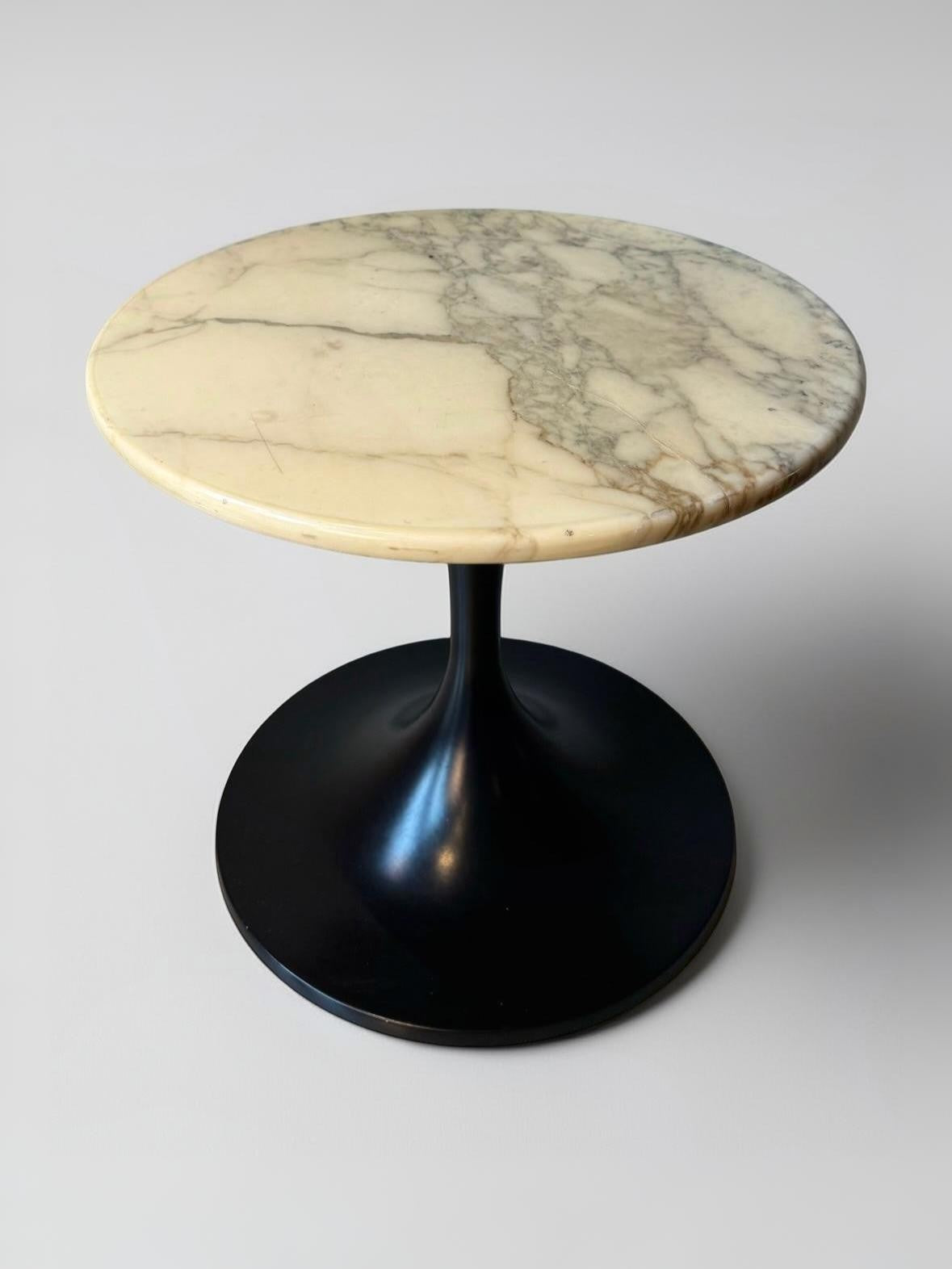 Marble side table with black trumpet base