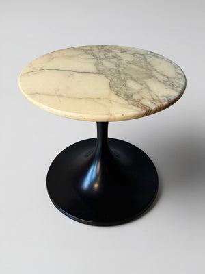Marble side table with black trumpet base